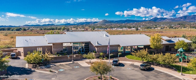 drone / aerial view featuring a mountain view