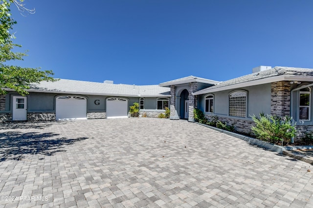 ranch-style house with a garage