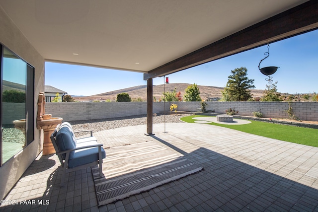 view of patio featuring a mountain view