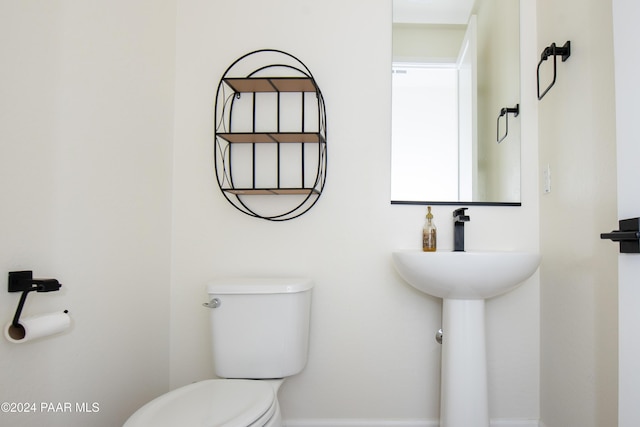 bathroom featuring toilet