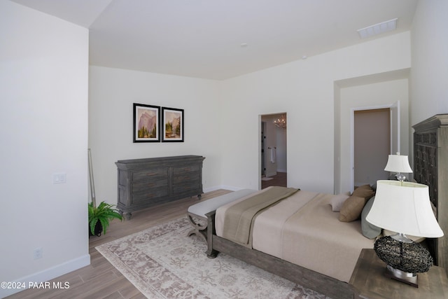 bedroom featuring light wood-type flooring