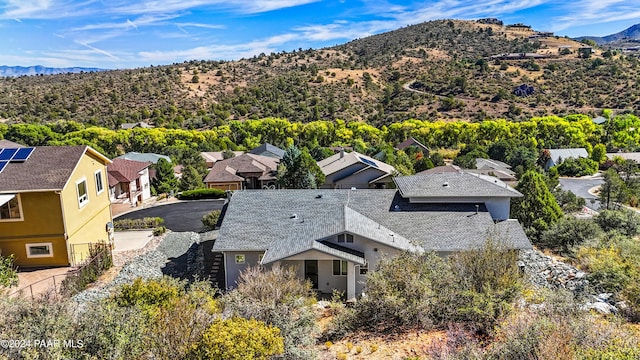 birds eye view of property featuring a mountain view