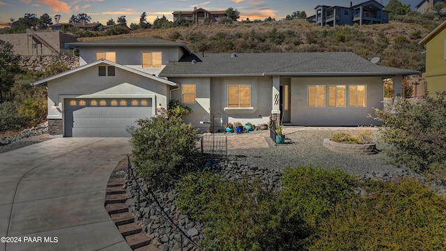 view of front of home featuring a garage