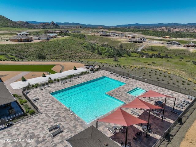 view of pool with a mountain view