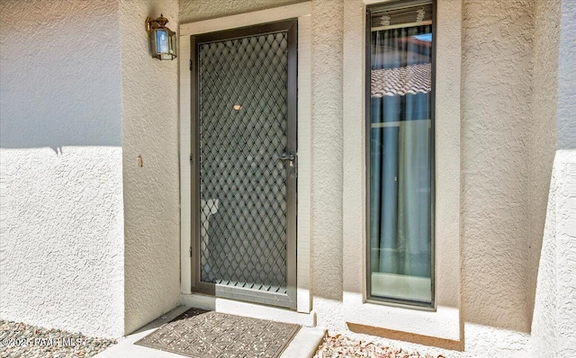 435 Jasmine Ln, Prescott, AZ 86301 - doorway to property with stucco siding