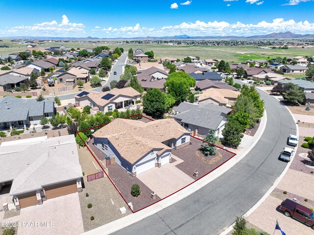 drone / aerial view featuring a mountain view