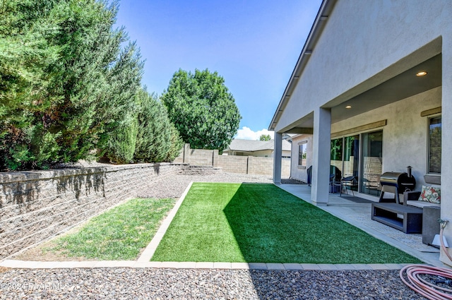 view of yard with a patio area