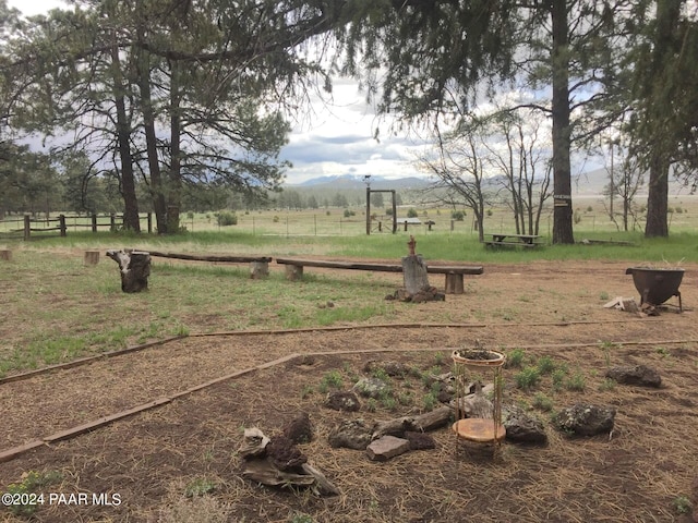 581 Cooper Ranch Rd, Williams, AZ 86046 - view of yard featuring a rural view and fence