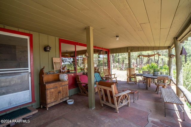 sunroom with wood ceiling