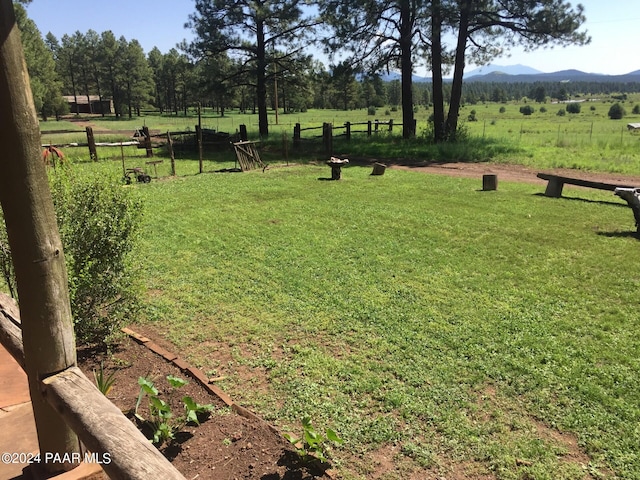 581 Cooper Ranch Rd, Williams, AZ 86046 - view of yard featuring a rural view, fence, and a mountain view