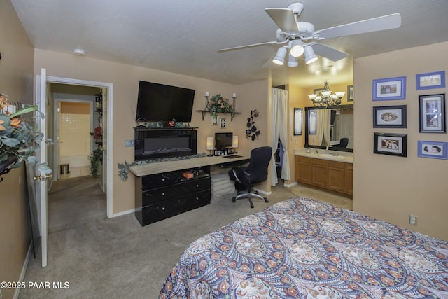 bedroom featuring light colored carpet, ensuite bath, baseboards, and ceiling fan with notable chandelier
