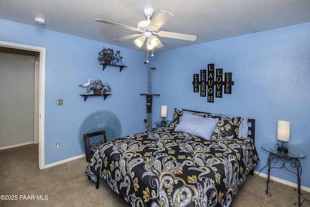 bedroom with baseboards, ceiling fan, and carpet floors