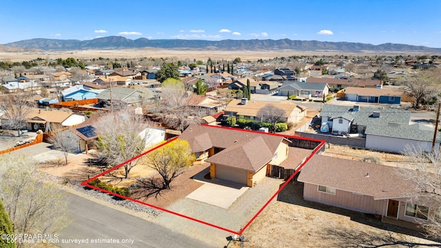 bird's eye view with a residential view and a mountain view