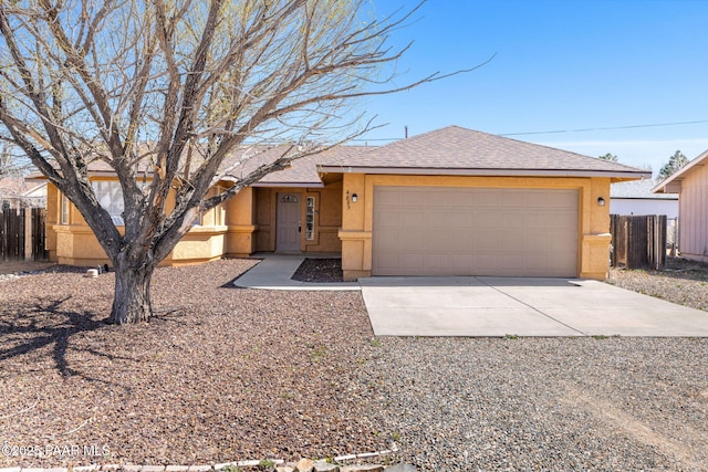 ranch-style home featuring fence, a shingled roof, stucco siding, concrete driveway, and a garage