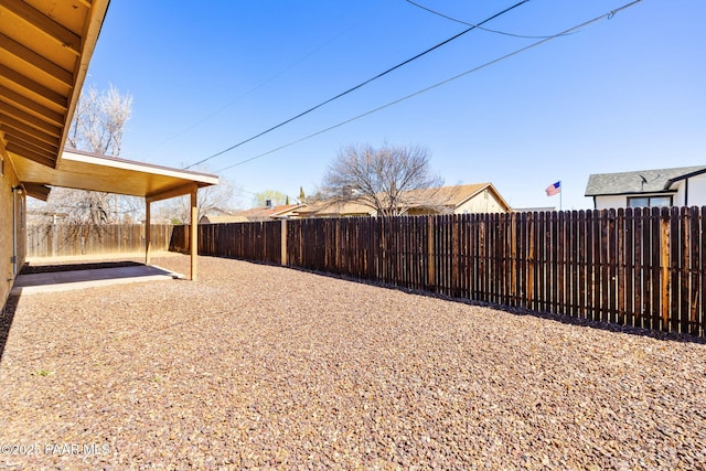 view of yard featuring a patio and a fenced backyard