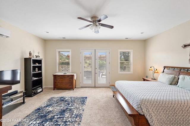 bedroom with access to outside, multiple windows, ceiling fan, and light carpet