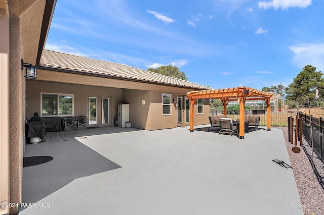 view of patio / terrace featuring a pergola and an outdoor hangout area