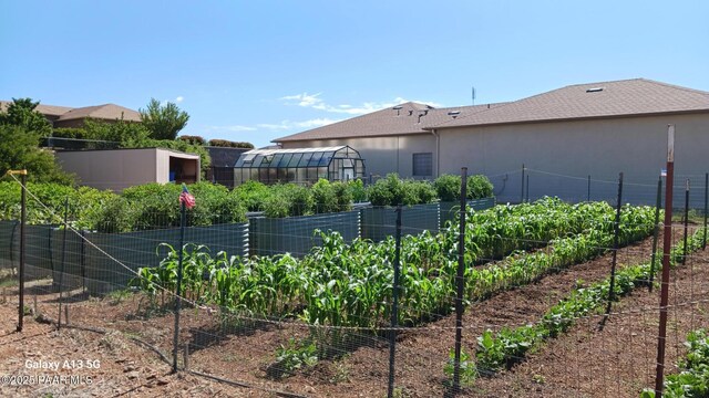 1850 S Crooked H Trl, Dewey-Humboldt, AZ 86327 - view of side of property with a patio and stucco siding