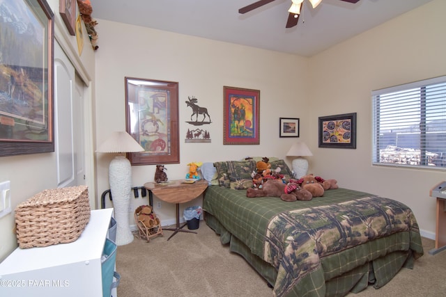 bedroom with carpet flooring, ceiling fan, and baseboards