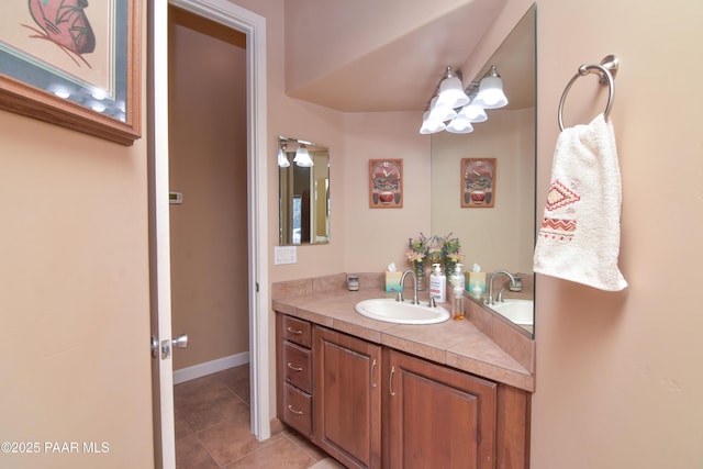 bathroom featuring tile patterned floors and vanity