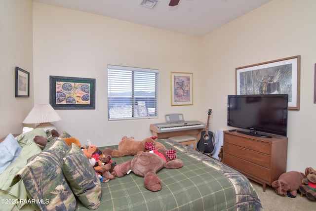 bedroom with carpet and a ceiling fan