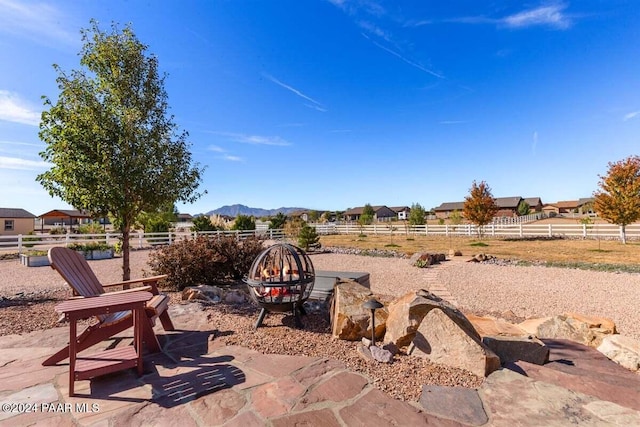 view of patio / terrace featuring a mountain view