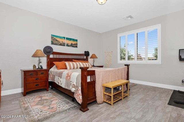 bedroom featuring hardwood / wood-style flooring