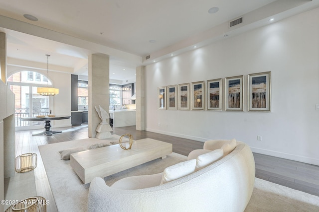 living room with light hardwood / wood-style floors