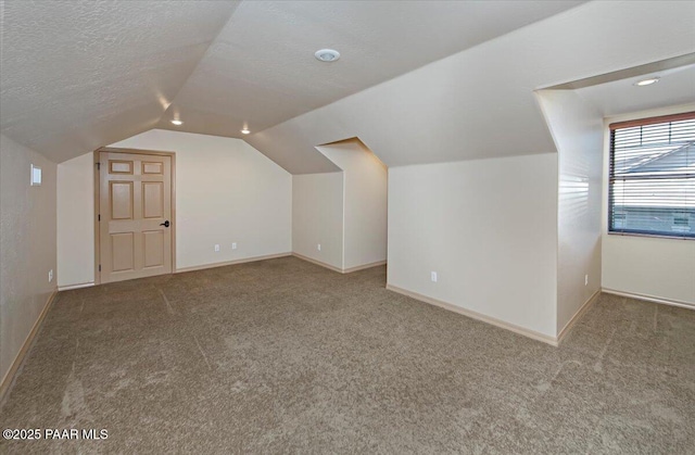 1498 Commonwealth St, Prescott, AZ 86301 - additional living space featuring carpet, lofted ceiling, and a textured ceiling