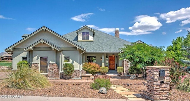 1498 Commonwealth St, Prescott, AZ 86301 - craftsman-style home with stucco siding, stone siding, a chimney, covered porch, and roof with shingles