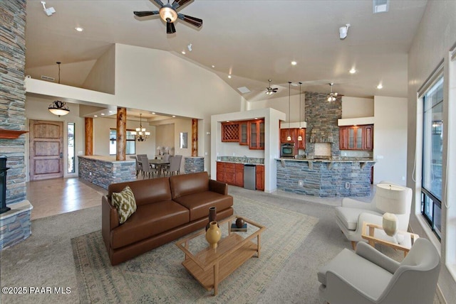 1498 Commonwealth St, Prescott, AZ 86301 - carpeted living area with ceiling fan, a fireplace, a chandelier, recessed lighting, and high vaulted ceiling