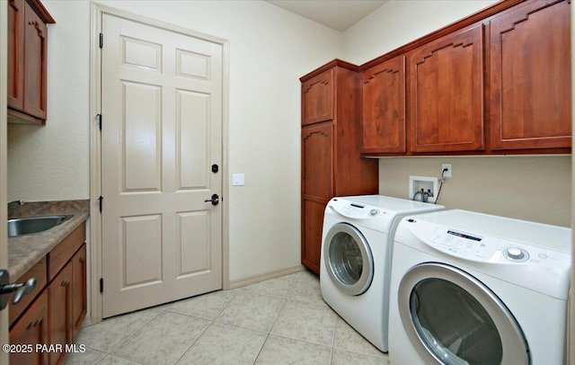 1498 Commonwealth St, Prescott, AZ 86301 - laundry room featuring cabinet space, washing machine and dryer, and light tile patterned floors