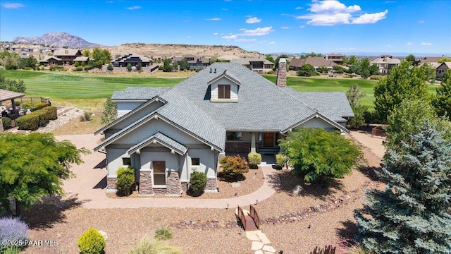 1498 Commonwealth St, Prescott, AZ 86301 - view of front of property with stone siding, a chimney, a residential view, and a mountain view