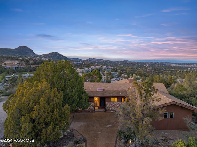 view of front of home featuring a mountain view