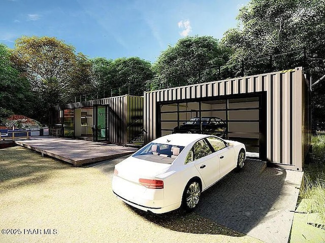 exterior space with a garage