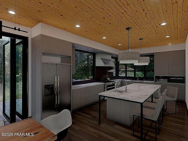 kitchen featuring a kitchen island, hanging light fixtures, wood ceiling, paneled refrigerator, and wall chimney exhaust hood