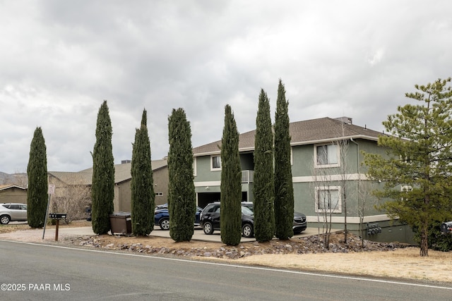 view of building exterior featuring driveway