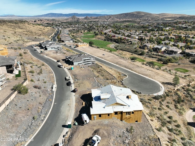 drone / aerial view featuring a mountain view