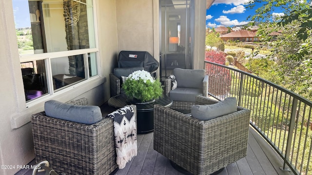 balcony featuring area for grilling