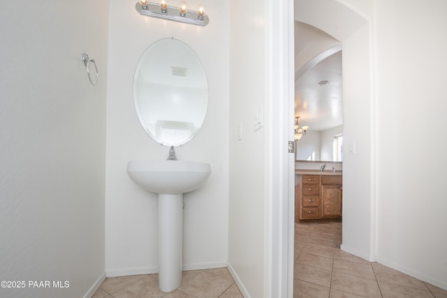 bathroom featuring sink and tile patterned floors