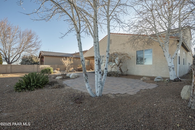 exterior space with a patio area