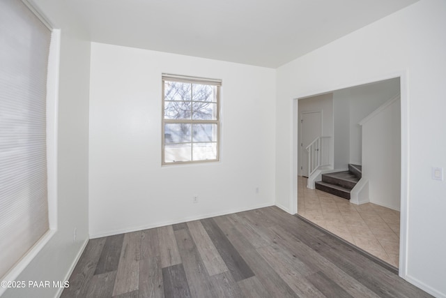 empty room featuring hardwood / wood-style floors