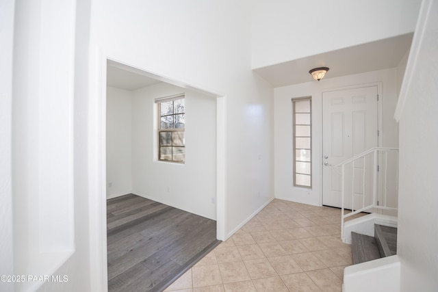 entrance foyer featuring light tile patterned floors