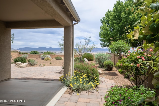 1891 N Tin Strap Trl, Prescott Valley, AZ 86314 - fenced backyard featuring a mountain view and a patio area