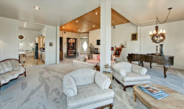 living room featuring ornate columns, light carpet, wood ceiling, and a chandelier