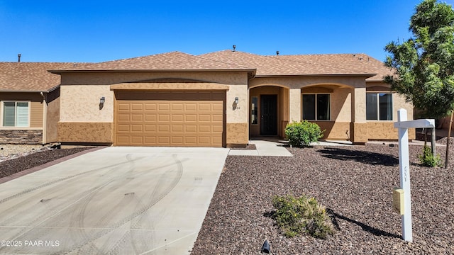 6286 E Livingston Loop, Prescott Valley, AZ 86314 - ranch-style home featuring an attached garage, driveway, and stucco siding