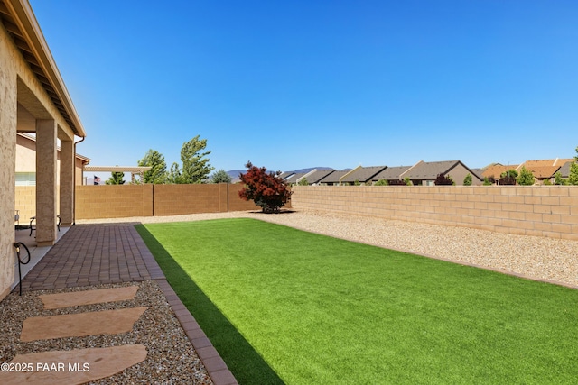 6286 E Livingston Loop, Prescott Valley, AZ 86314 - fenced backyard with a patio area