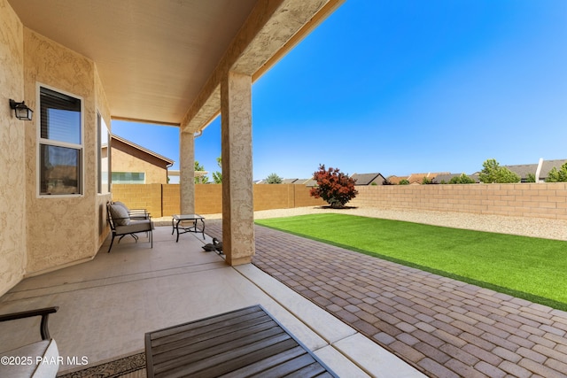 6286 E Livingston Loop, Prescott Valley, AZ 86314 - fenced backyard with a patio area