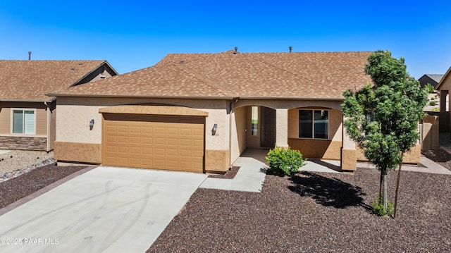 6286 E Livingston Loop, Prescott Valley, AZ 86314 - single story home featuring a garage, stucco siding, concrete driveway, and a shingled roof