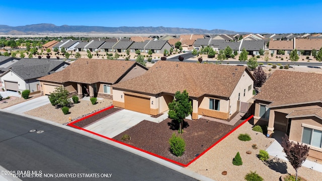 6286 E Livingston Loop, Prescott Valley, AZ 86314 - aerial perspective of suburban area with property boundaries highlighted and a mountain backdrop